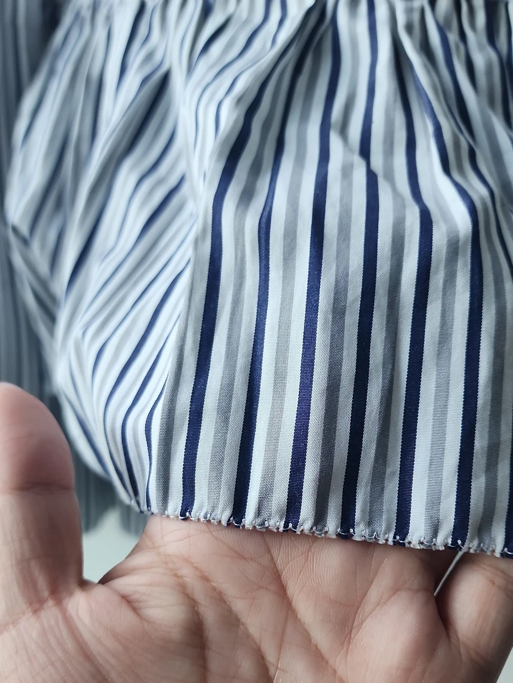 minki Smocked Pleated Uneven Hem Shirt Dress - Picture 6 of 11